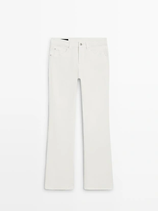 Джинсы с узкими брючинами и расширенным низом- Заказать в России