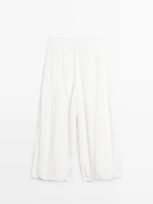 Текстурированные брюки-саруэль с линейной посадкой- Заказать в России