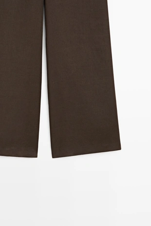 Брюки из льна с летящим фасоном- Заказать в России