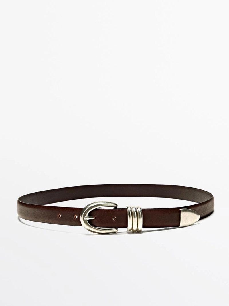 Кожанный ремень с металлической деталью