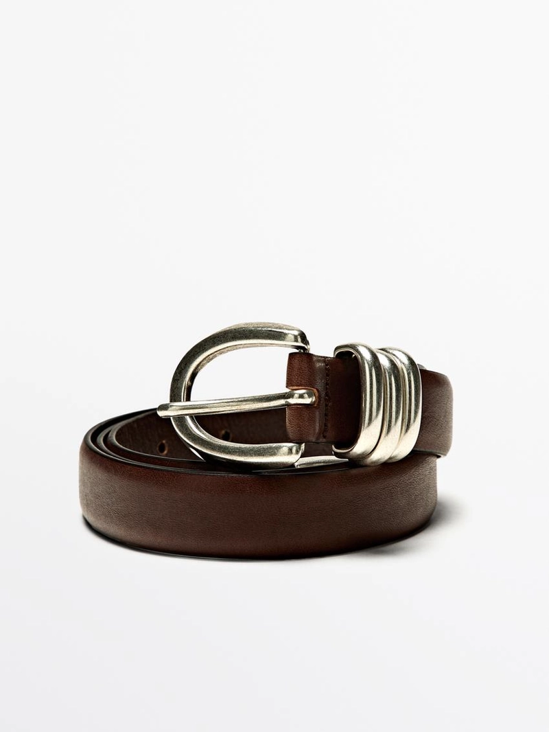 Кожанный ремень с металлической деталью