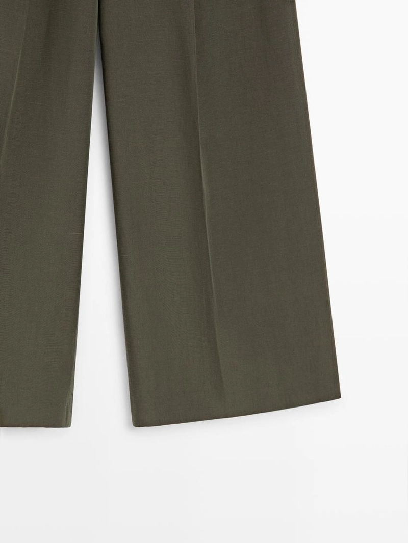 Широкие брюки с защипами