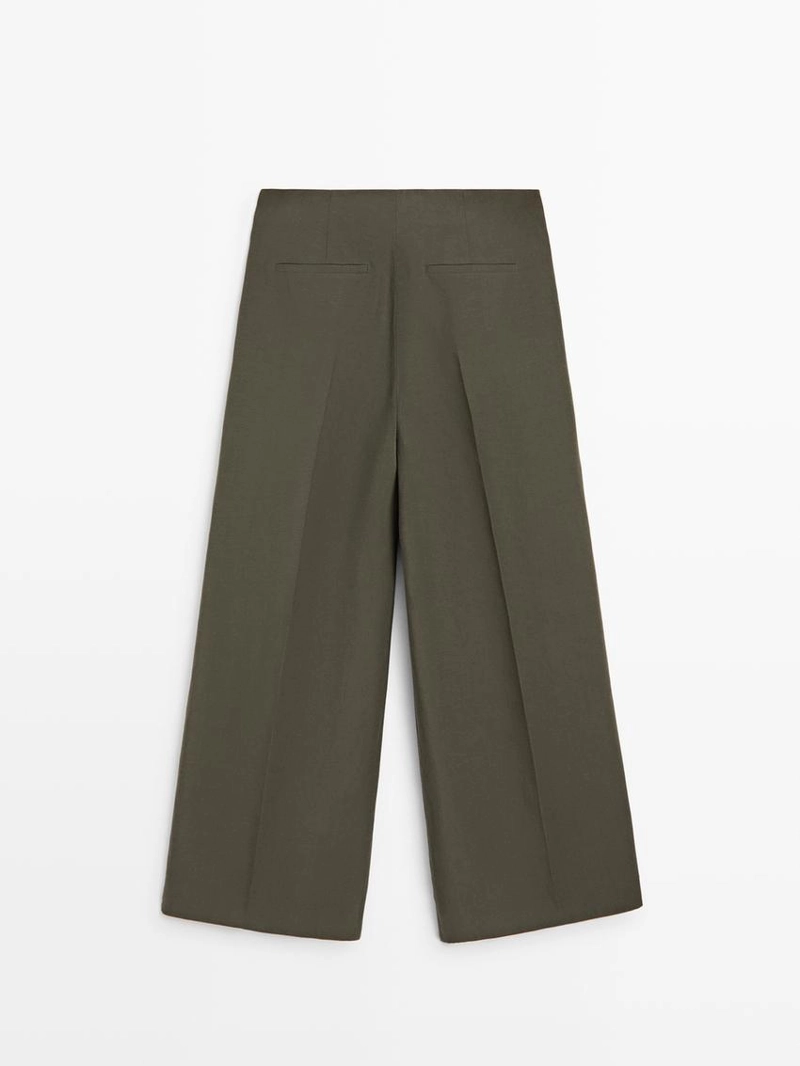 Широкие брюки с защипами