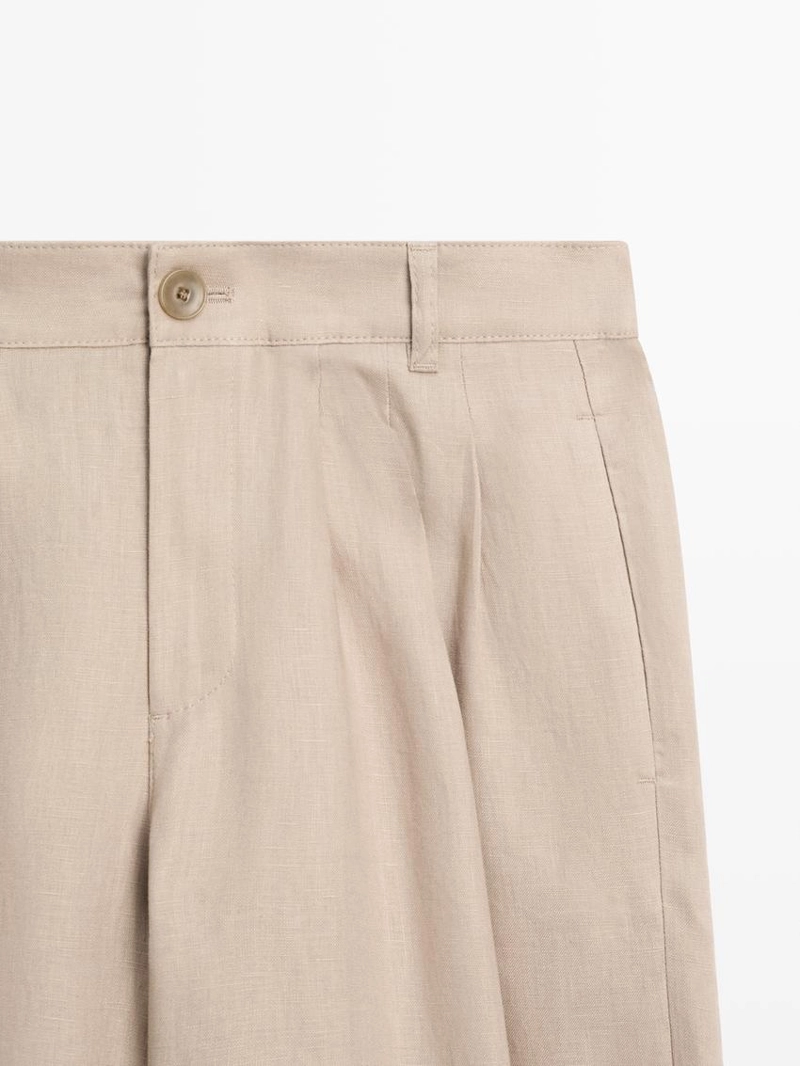 Широкие льняные брюки со складками - studio