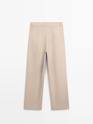 Широкие льняные брюки со складками - studio- Заказать в России