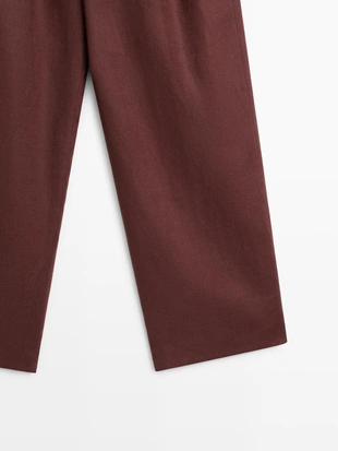 Широкие льняные брюки со складками - studio- Заказать в России