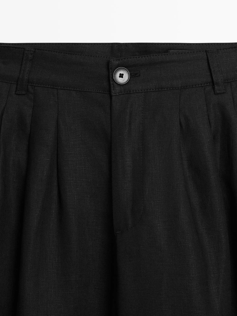 Широкие льняные брюки с защипами - studio