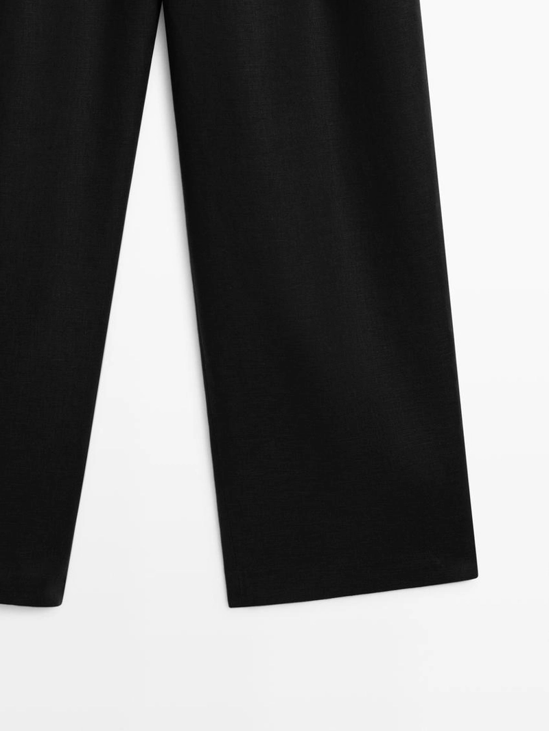 Широкие льняные брюки с защипами - studio