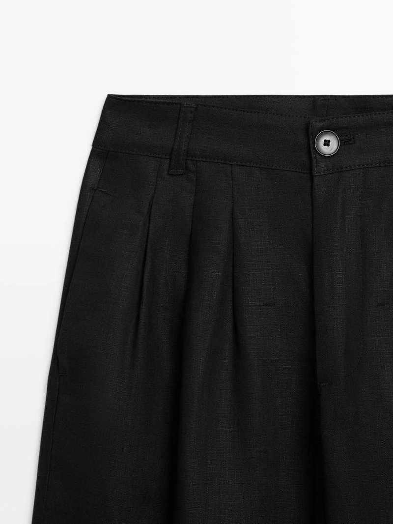 Широкие льняные брюки с защипами - studio