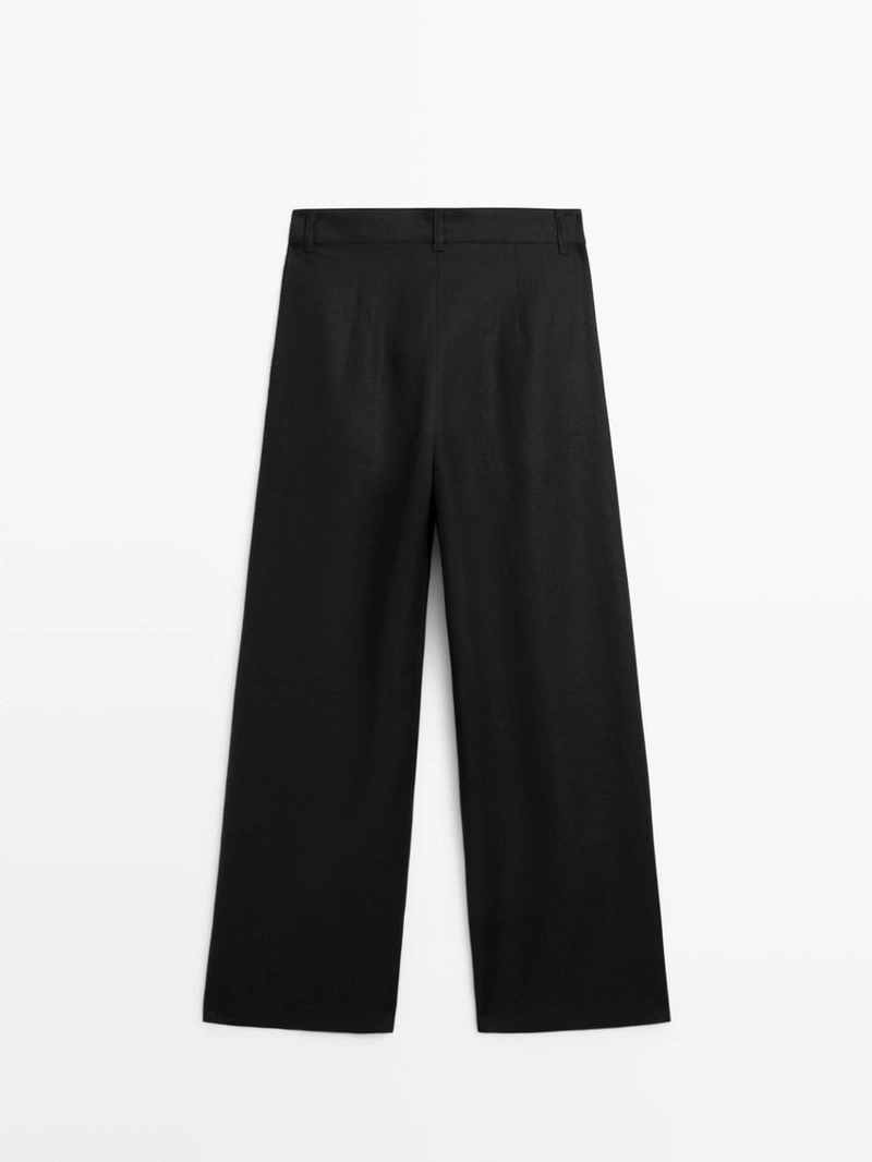 Широкие льняные брюки с защипами - studio