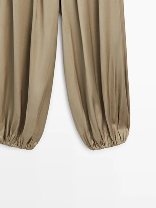 Брюки свободного кроя из атласа- Заказать в России