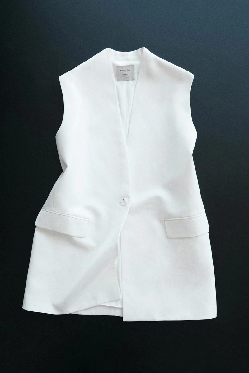 Жилетка, бермуды из текстиля, пальто из хлопковой смеси, миди-юбка годе, миди-платье из кожи. 