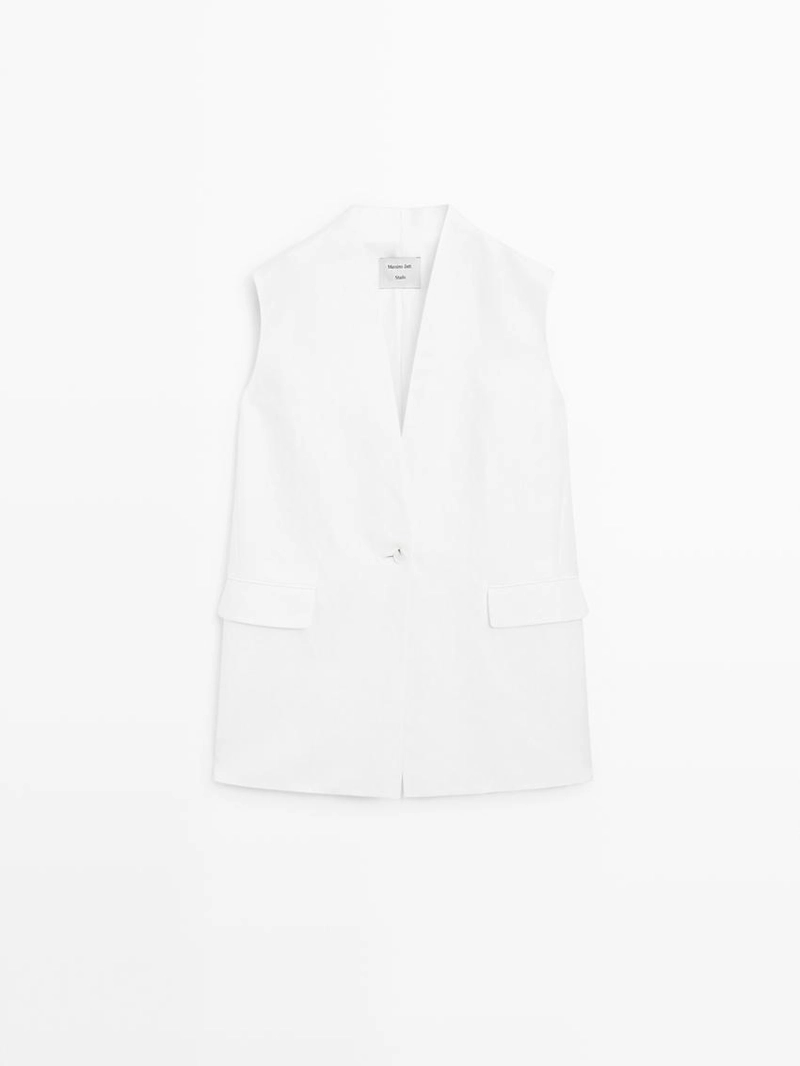 Жилетка, бермуды из текстиля, пальто из хлопковой смеси, миди-юбка годе, миди-платье из кожи. 