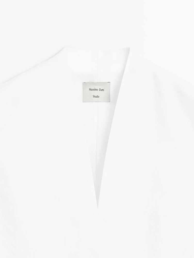 Жилетка, бермуды из текстиля, пальто из хлопковой смеси, миди-юбка годе, миди-платье из кожи. 