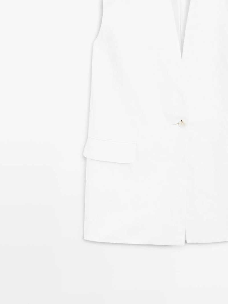 Жилетка, бермуды из текстиля, пальто из хлопковой смеси, миди-юбка годе, миди-платье из кожи. 