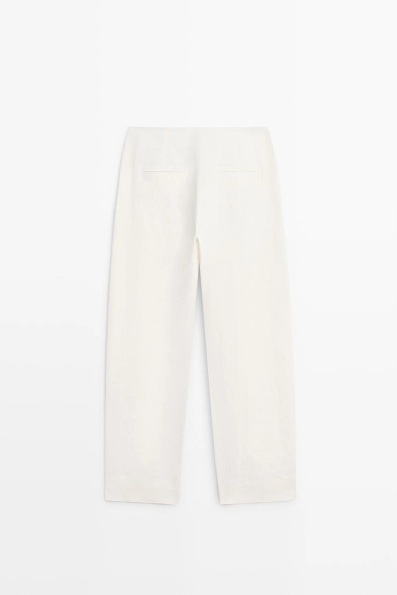 Брюки из льна с драпировкой и манжетами на резинке