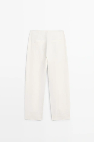 Брюки из льна с драпировкой и манжетами на резинке- Заказать в России