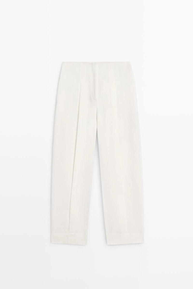 Брюки из льна с драпировкой и манжетами на резинке