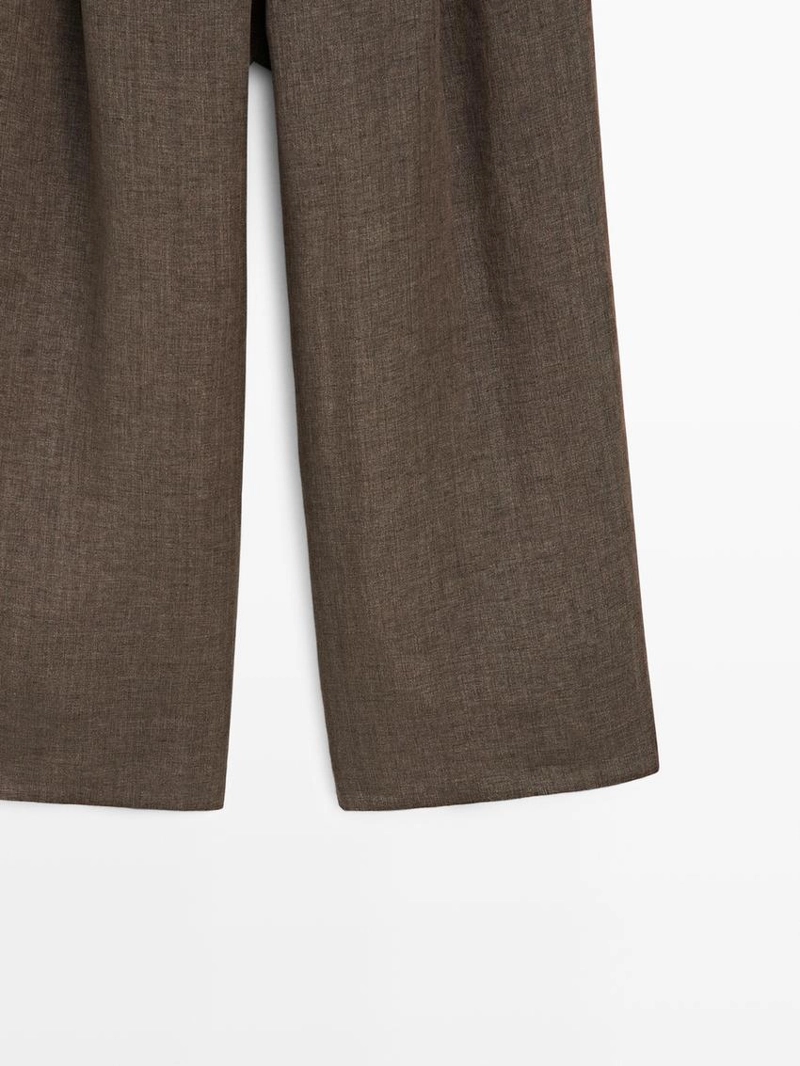 Льняные меланжевые защипанные брюки