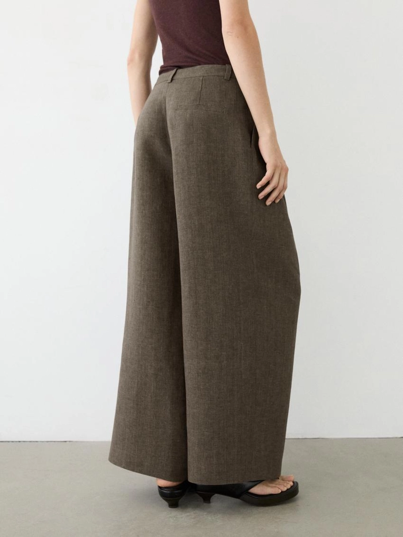 Льняные меланжевые защипанные брюки