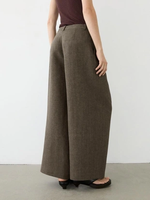 Льняные меланжевые защипанные брюки- Заказать в России