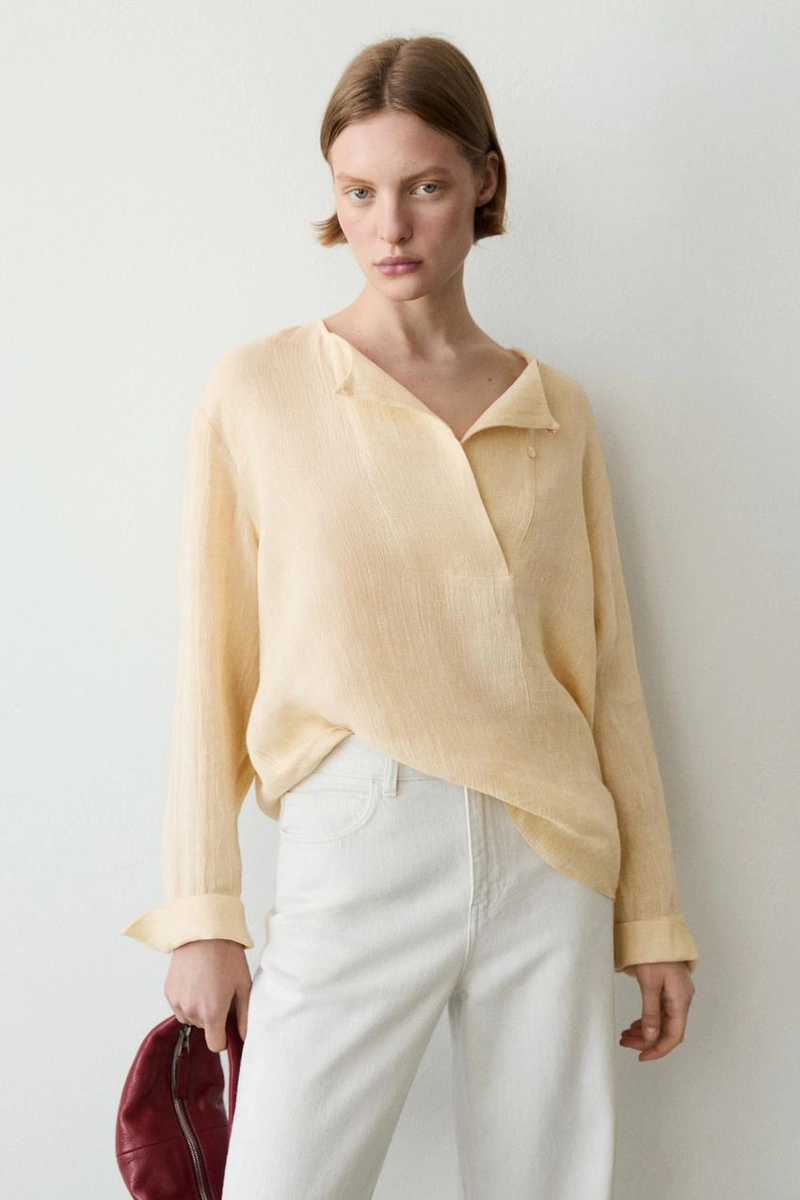 Приталенный льняной блуз с деталями на груди