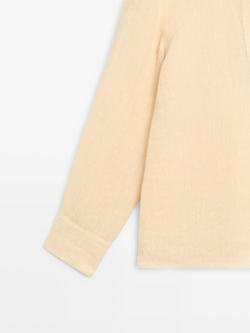 Приталенный льняной блуз с деталями на груди