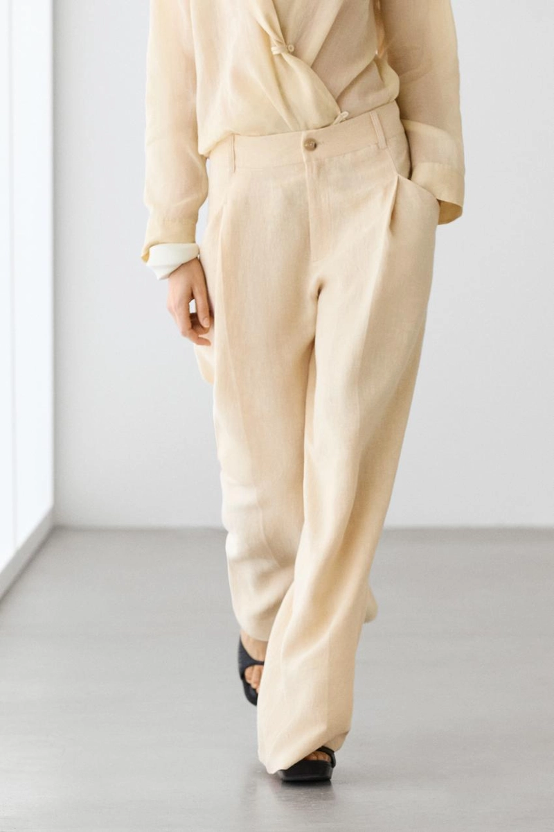 Широкие льняные брюки с карманами