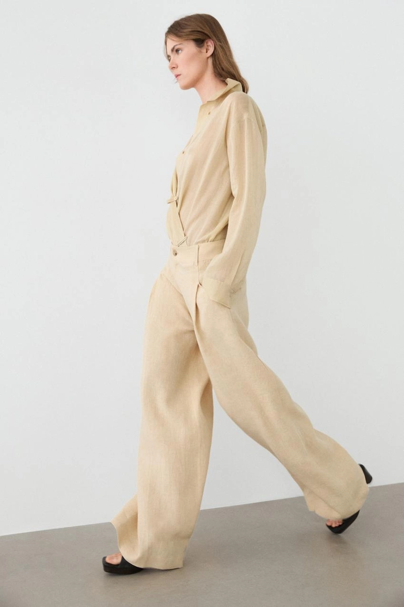 Широкие льняные брюки с карманами