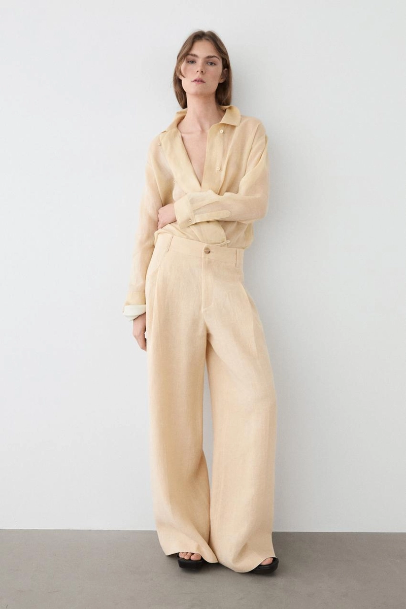 Широкие льняные брюки с карманами