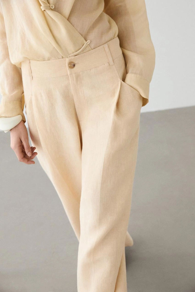 Широкие льняные брюки с карманами