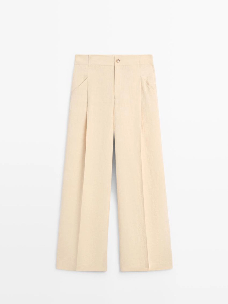 Широкие льняные брюки с карманами