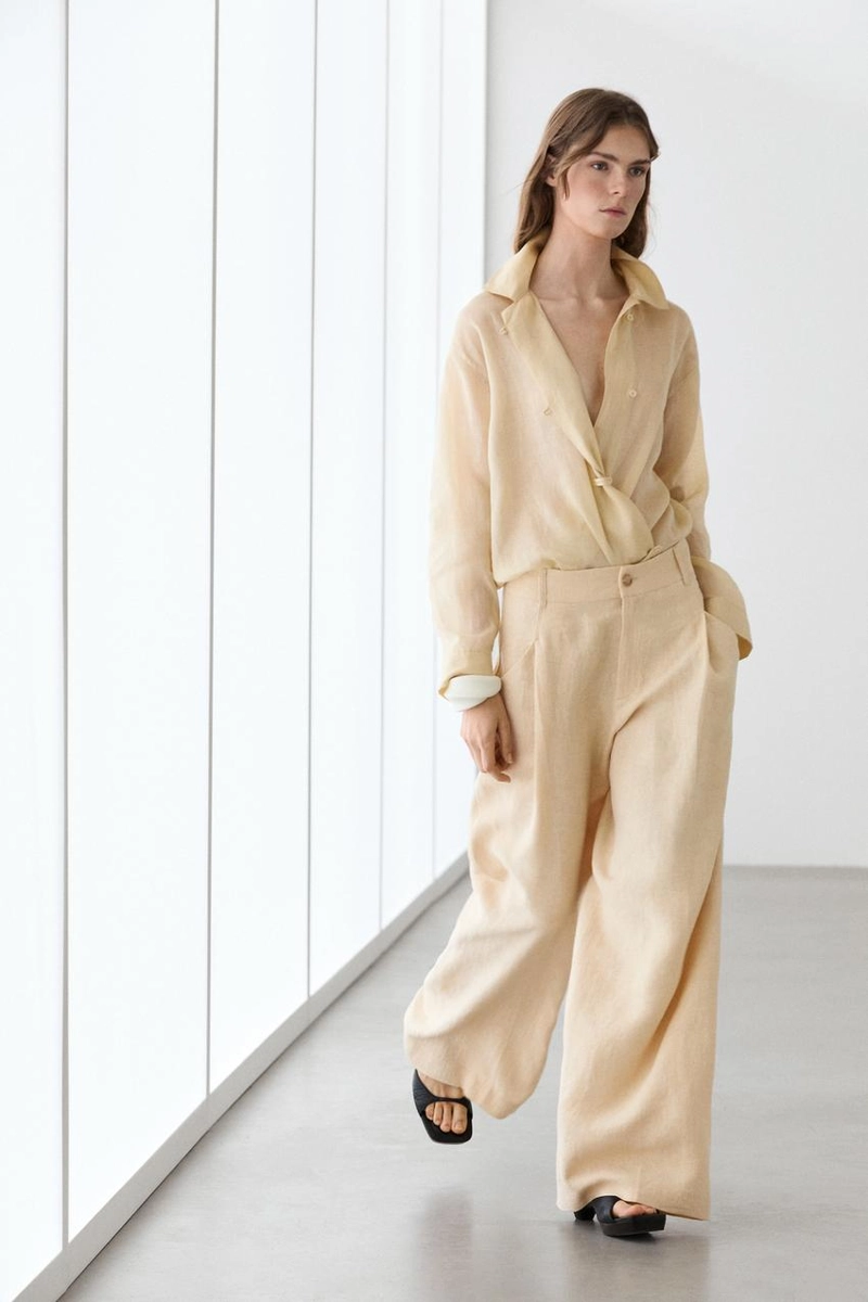 Широкие льняные брюки с карманами