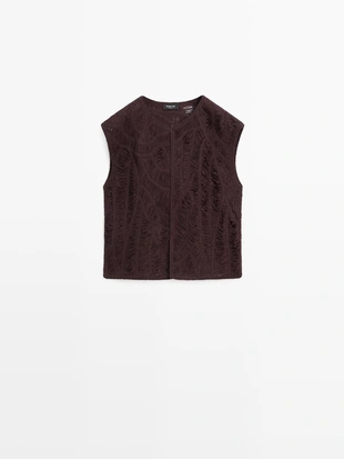 Жилет вязаный крючком- Заказать в России