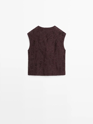 Жилет вязаный крючком- Заказать в России