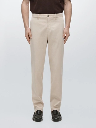 Хлопковые брюки в стиле джоггер из смеси хлопка- Заказать в России