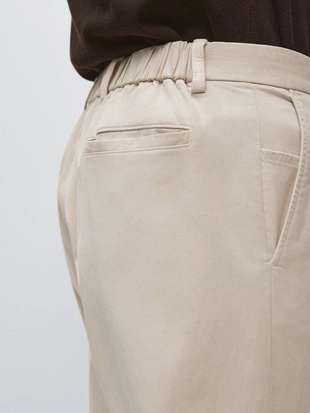 Хлопковые брюки в стиле джоггер из смеси хлопка- Заказать в России