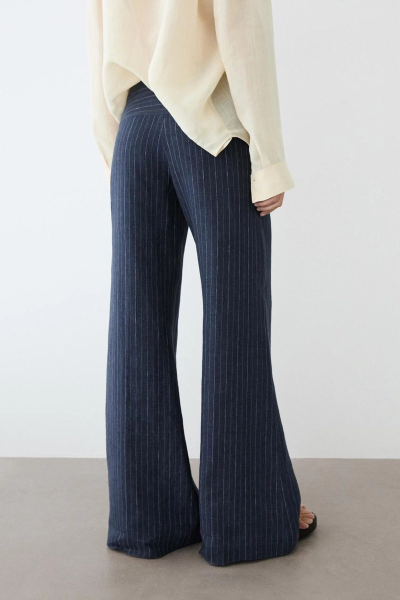 Брюки из льна с зауженными штанинами и полосатыми деталями