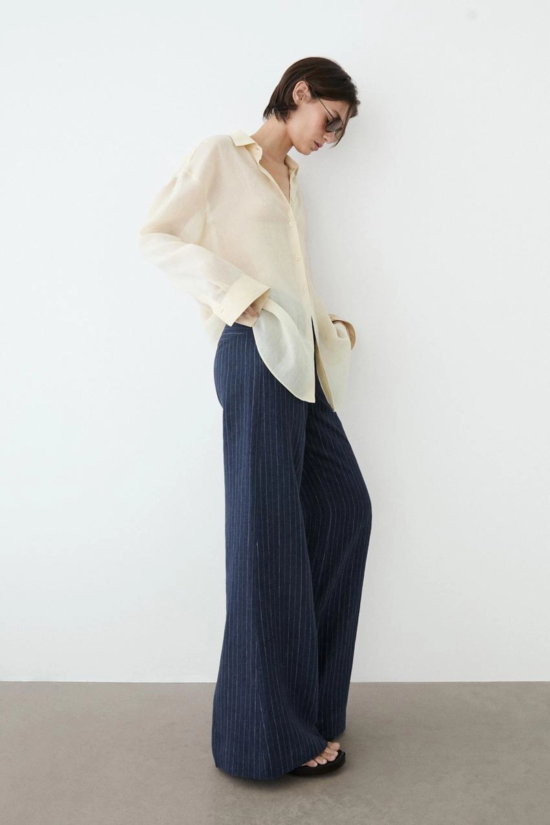 Брюки из льна с зауженными штанинами и полосатыми деталями