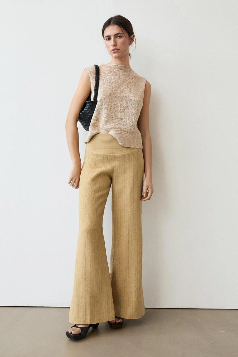 Брюки из льна с расширяющимся кроем и полосатыми деталями