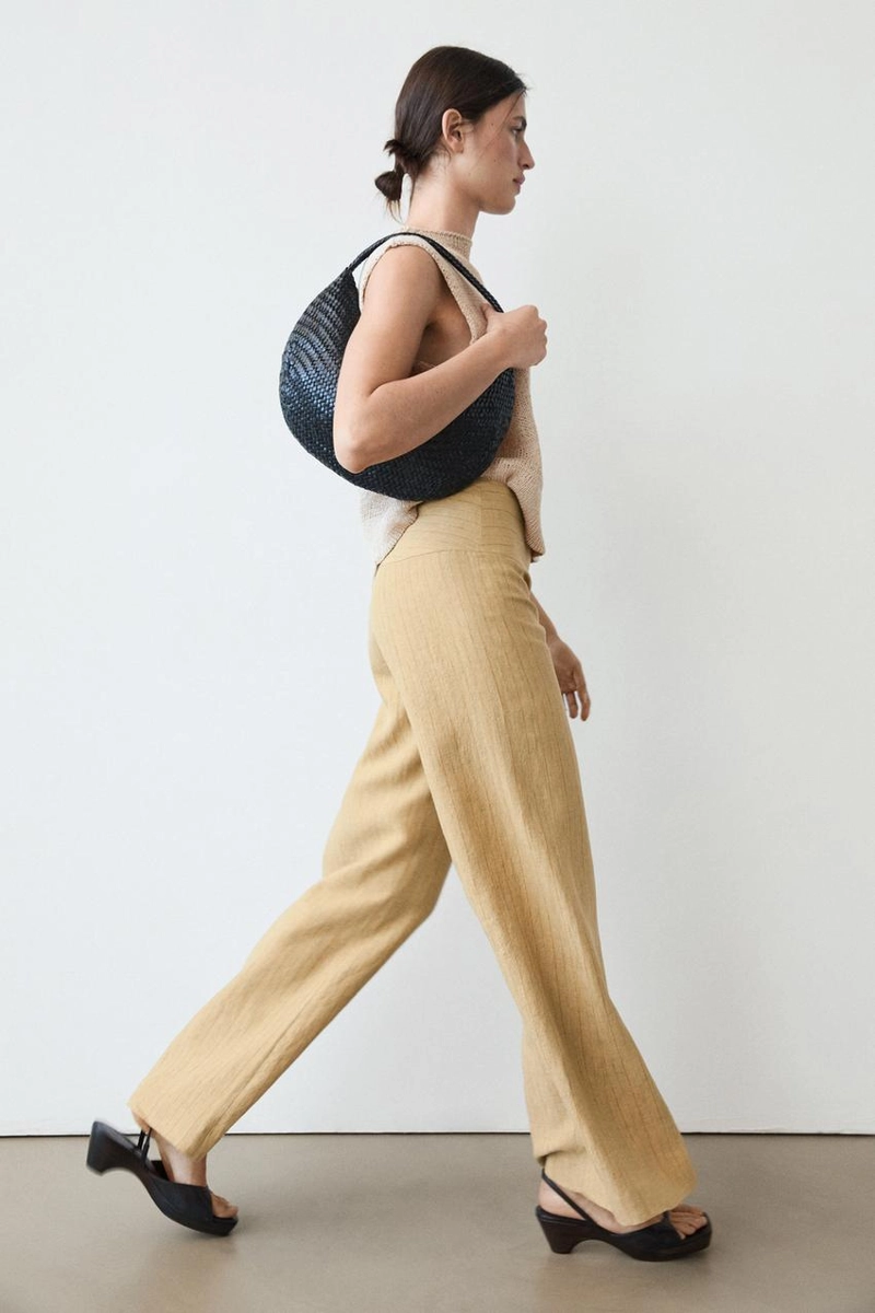 Брюки из льна с расширяющимся кроем и полосатыми деталями