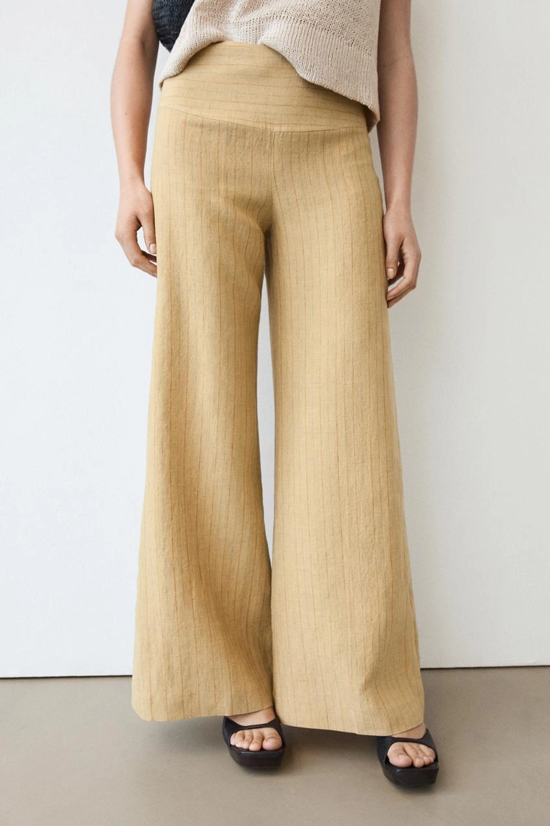 Брюки из льна с расширяющимся кроем и полосатыми деталями