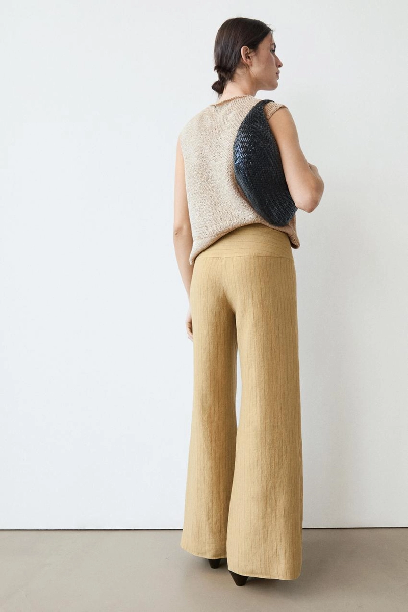 Брюки из льна с расширяющимся кроем и полосатыми деталями