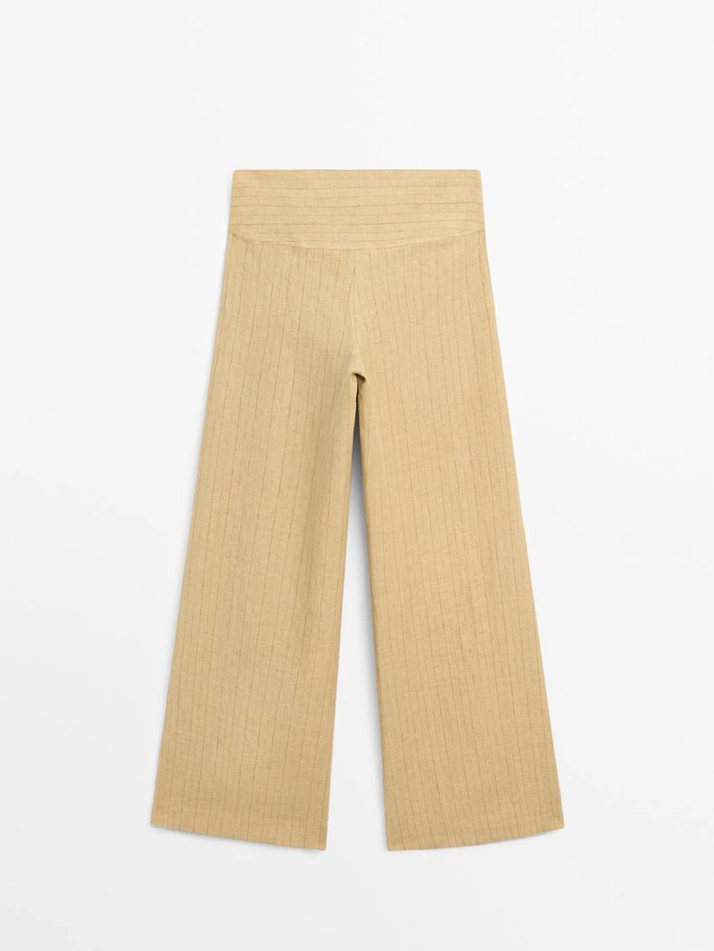 Брюки из льна с расширяющимся кроем и полосатыми деталями
