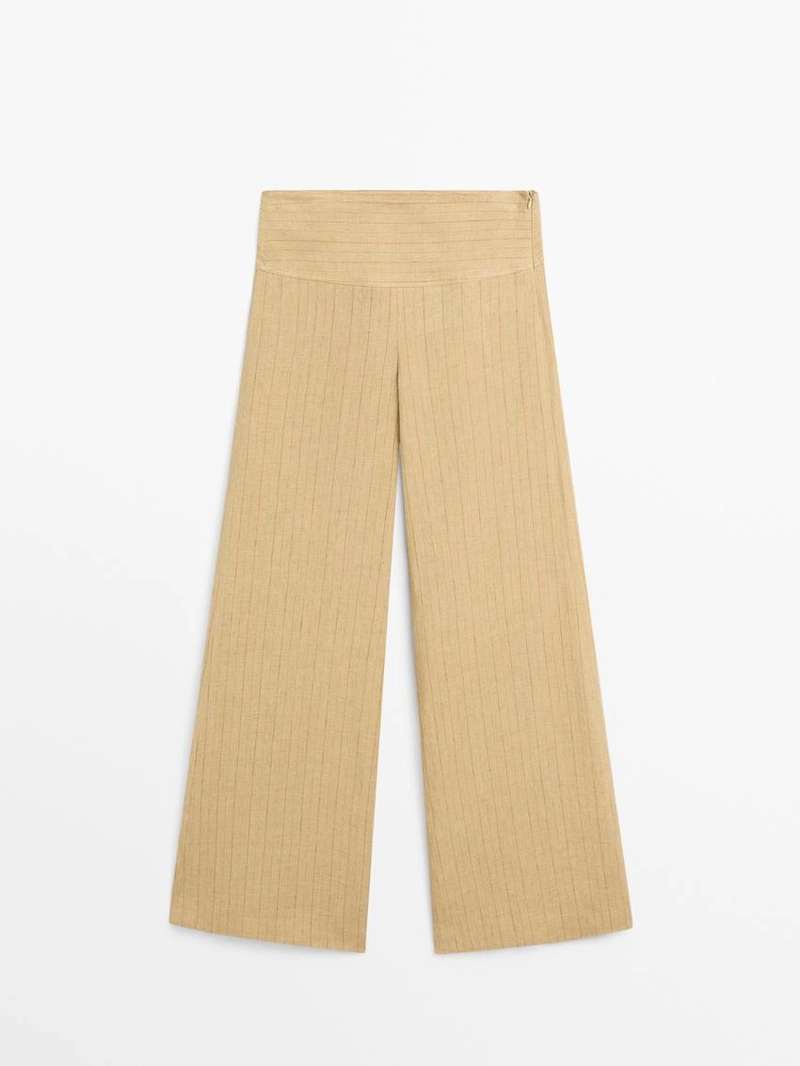 Брюки из льна с расширяющимся кроем и полосатыми деталями