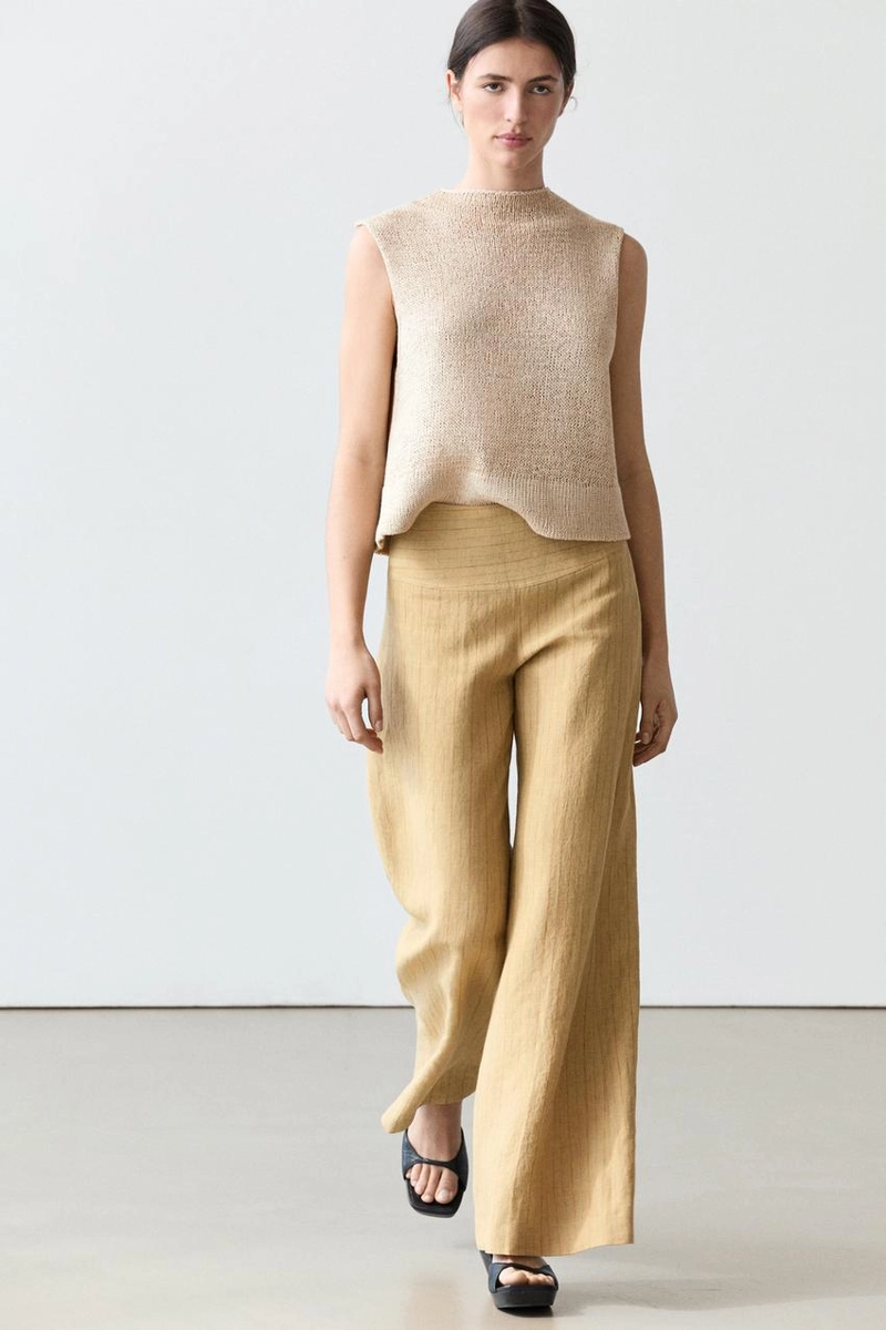 Брюки из льна с расширяющимся кроем и полосатыми деталями