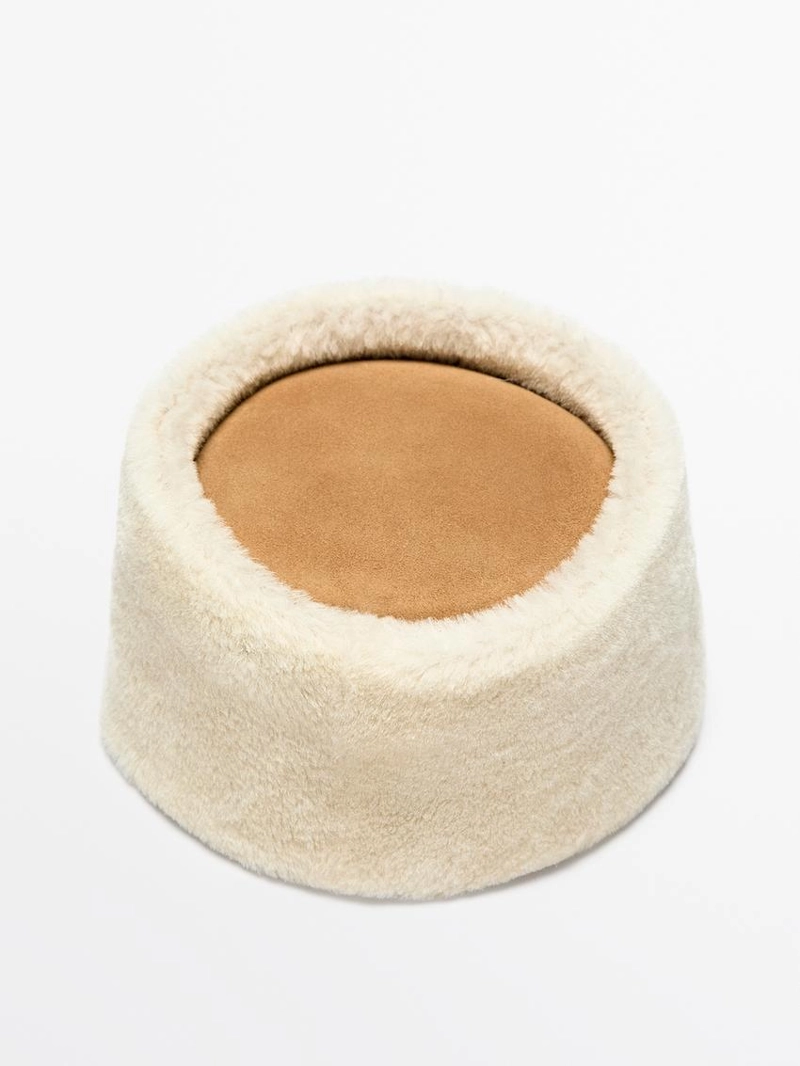 Кожаная шапка с двухсторонней отделкой