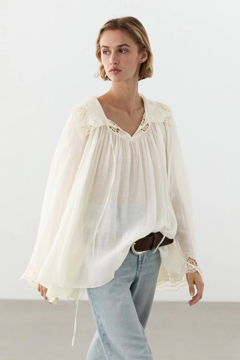 Вышитая блузка в полупрозрачной ткани