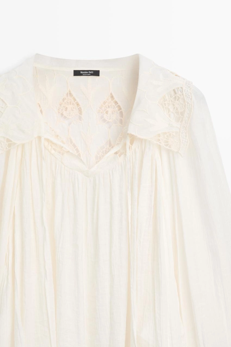 Вышитая блузка в полупрозрачной ткани