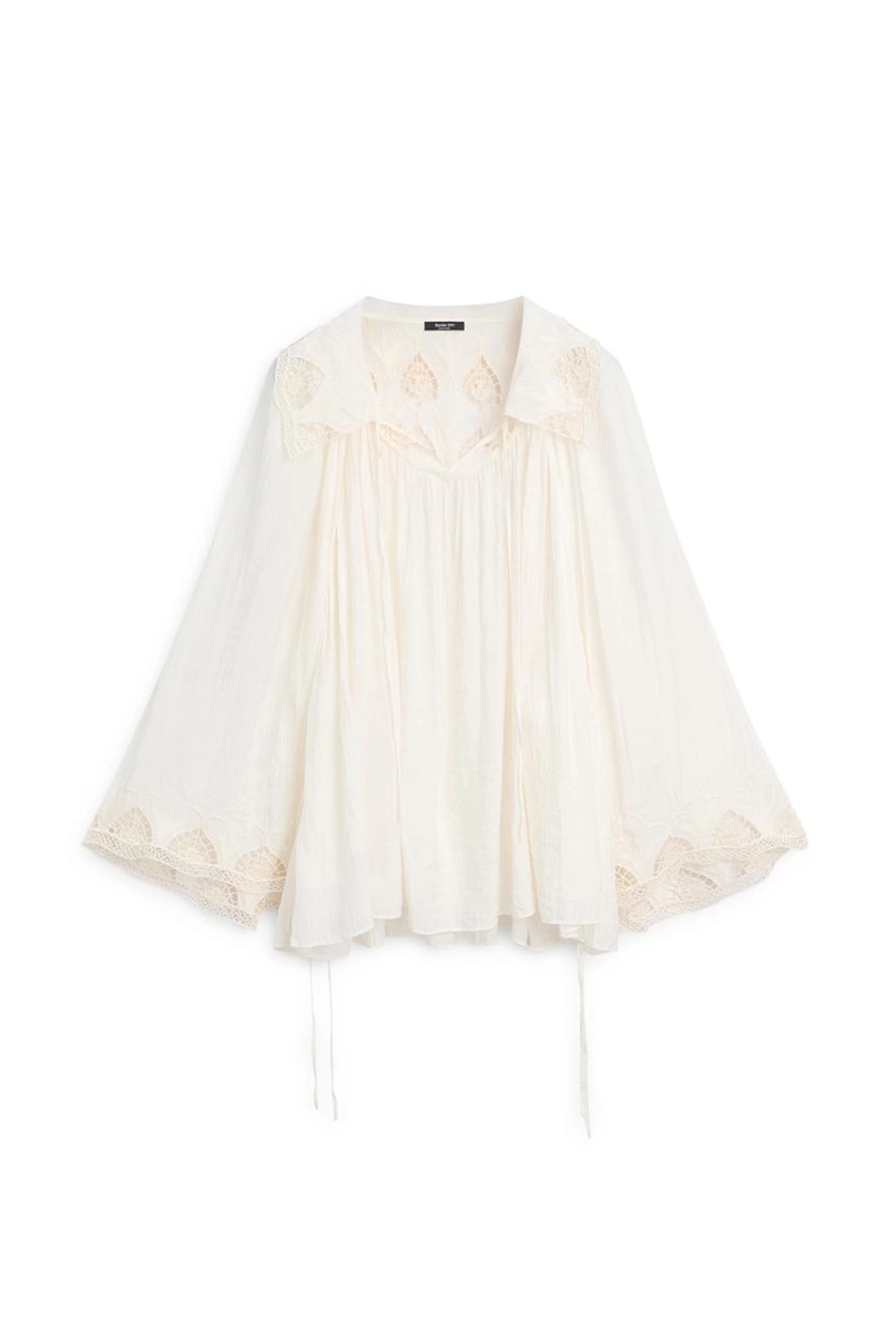 Вышитая блузка в полупрозрачной ткани